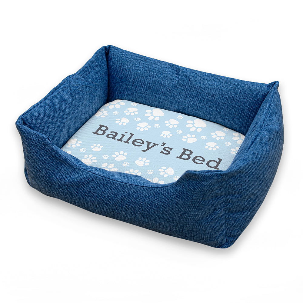 Personalised Blue Comfort Dog Bed With Blue Paw Print Design